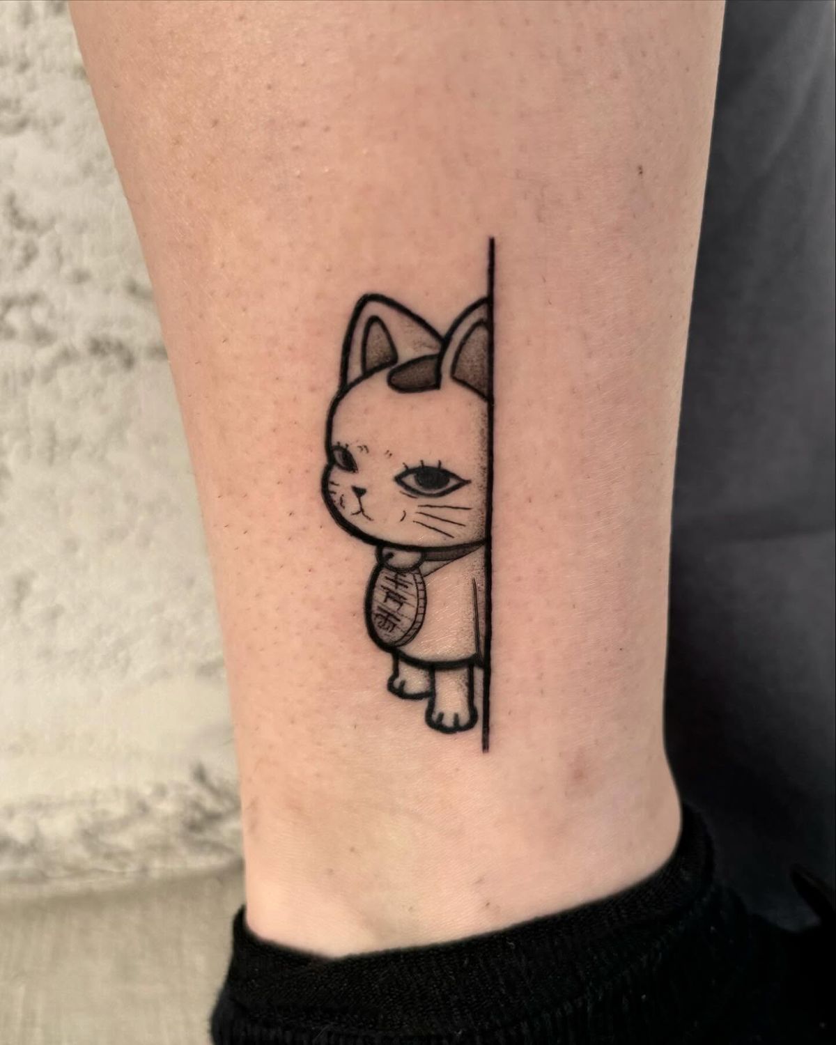 미니타투: 발목에 새겨진 고양이 타투